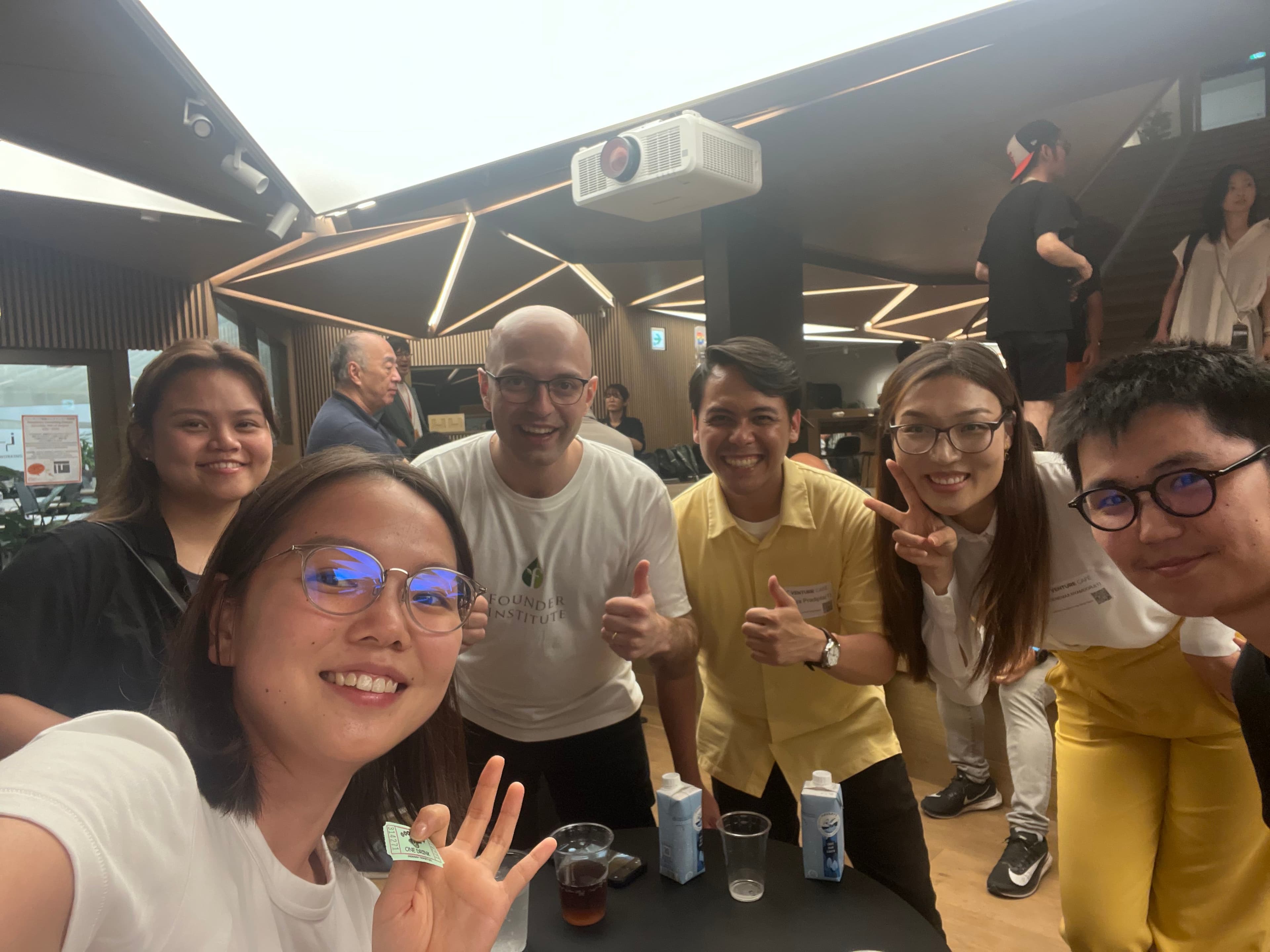 My badge on top of a pile of badges from a Vercel meetup we held